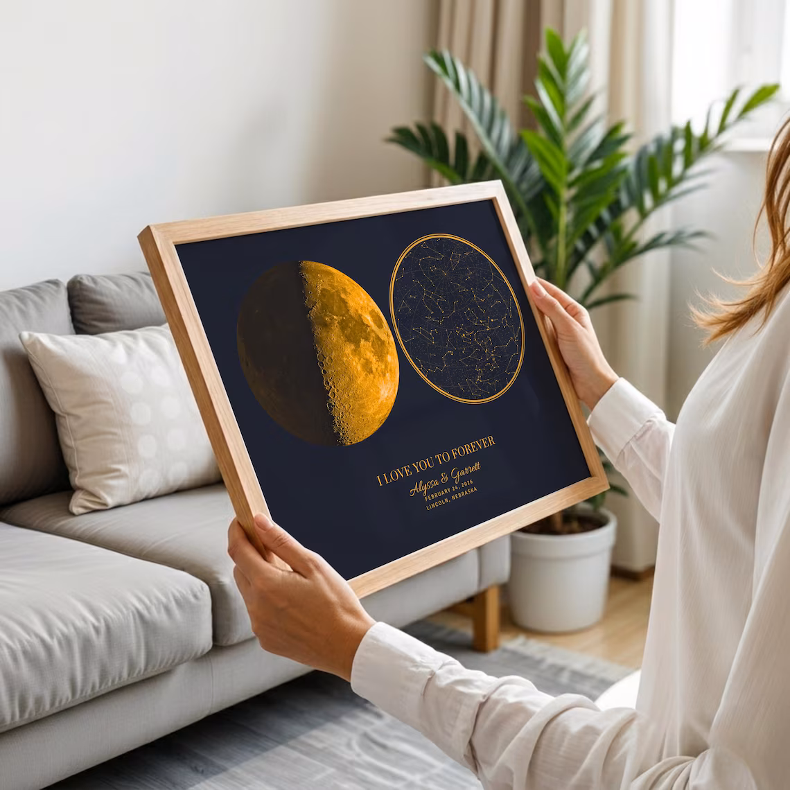 A beautifully framed star map poster in a modern interior